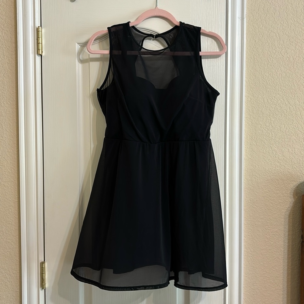 Sz Torrid 1. Black swimsuit.